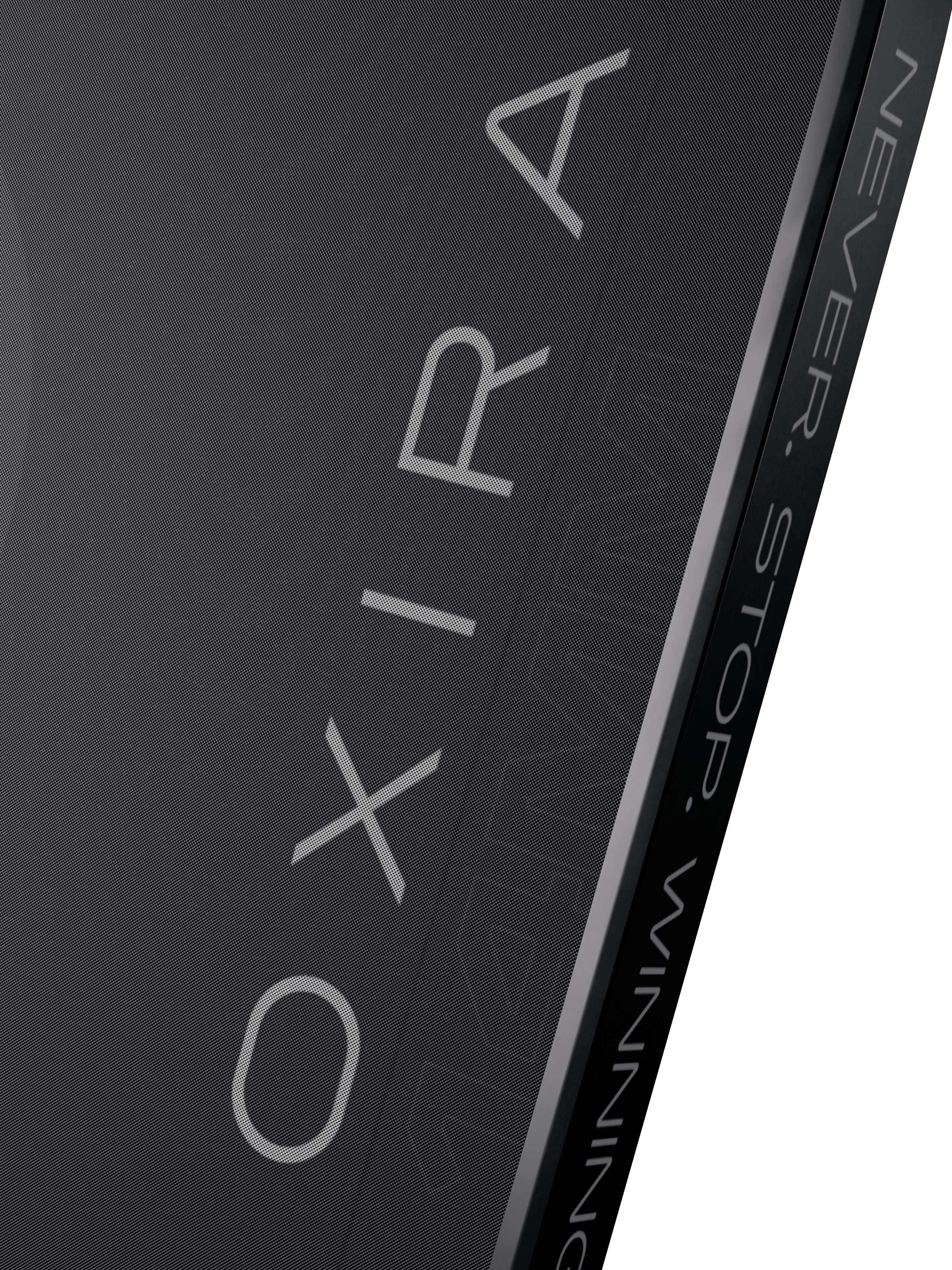 Close-up of a black pickleball paddle with 'OXIRA' branding and text on a dark background